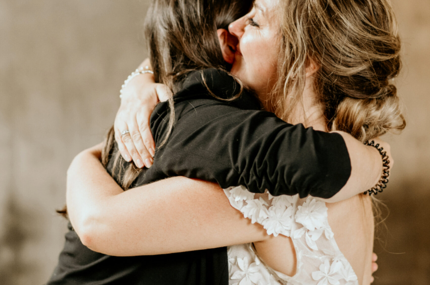 Bride hugging coordinator